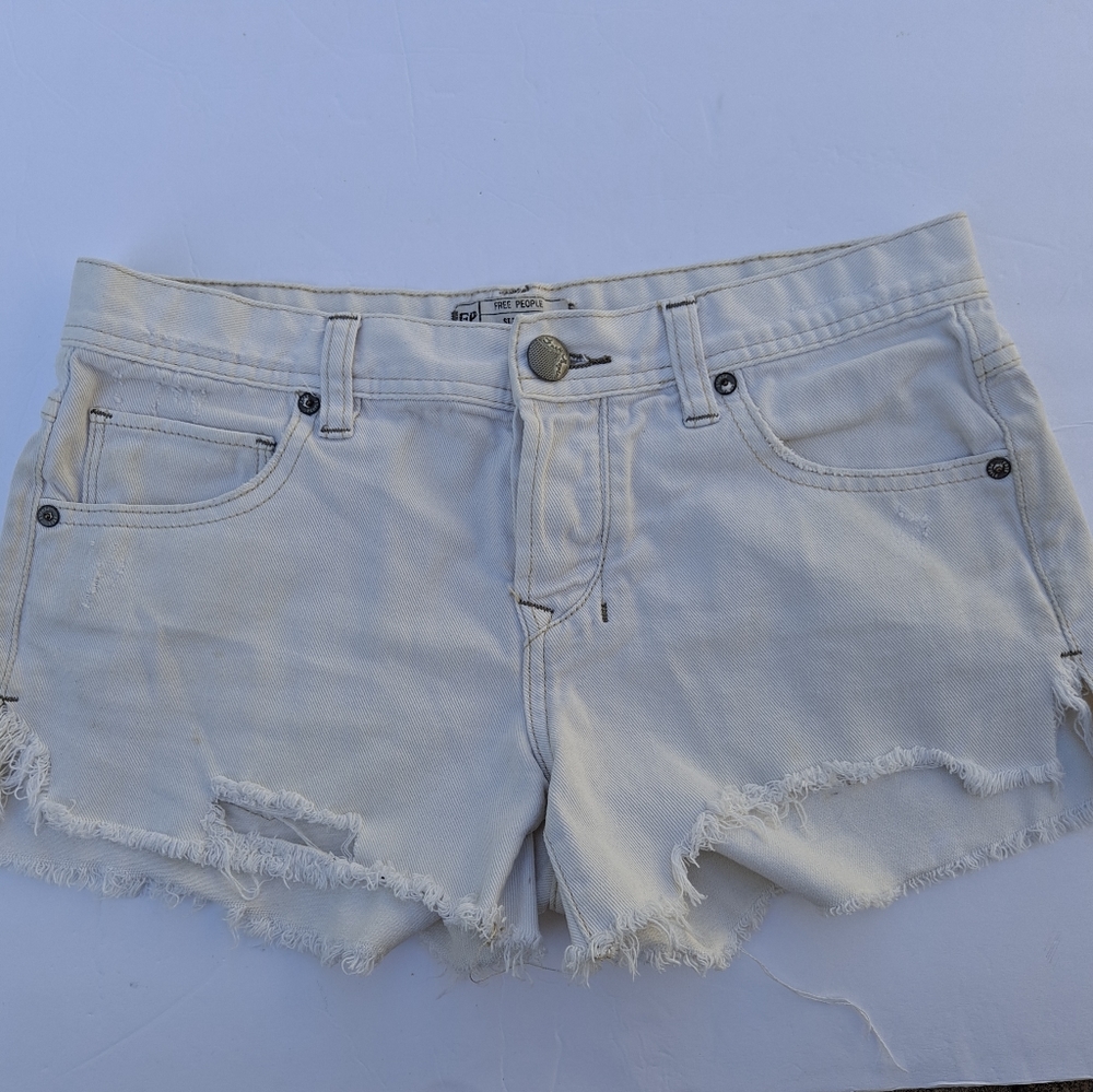 Free People Distressed Raw Hem Beige Denim Shorts.